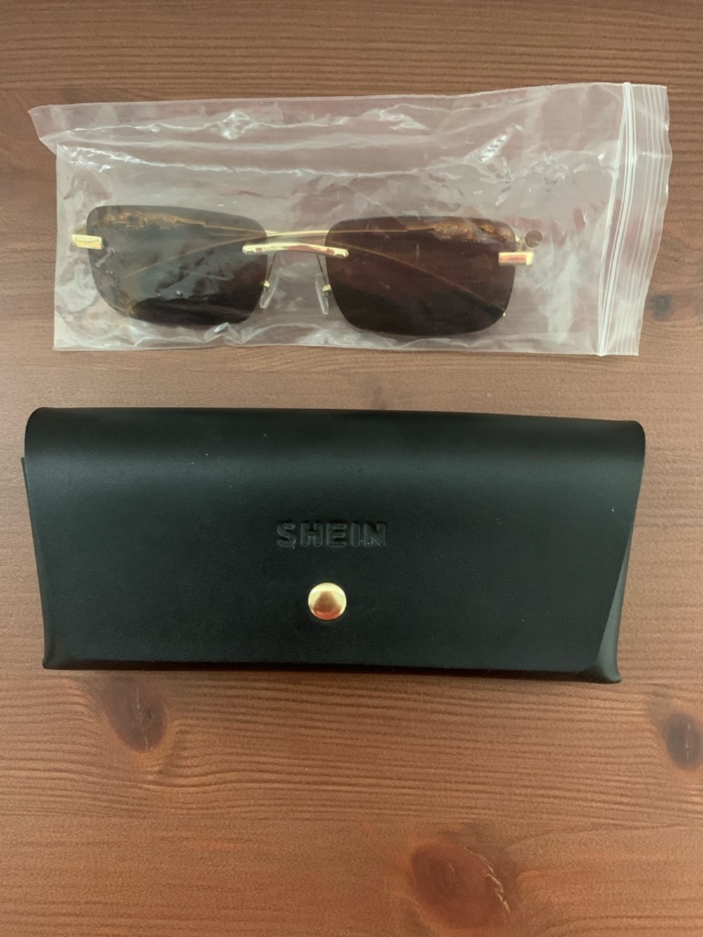 Gold Frame Brown Lens Rimless Sunglasses with Black Case